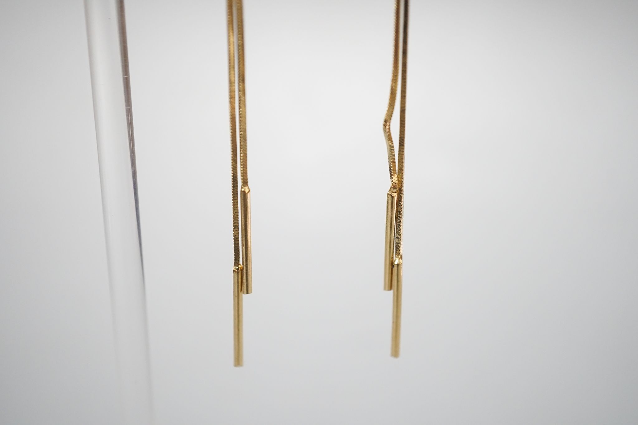 A pair of 585 yellow metal and white stone set tassel drop earrings, gross 4 grams